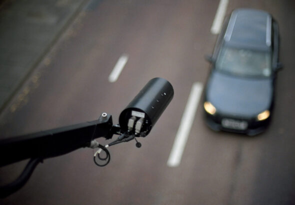 CCTV pointing on car - view from above, blurred background